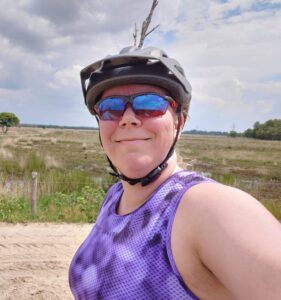 Marlies met Rudy Project Magnus Carbonium Photochromic 2Laser Red